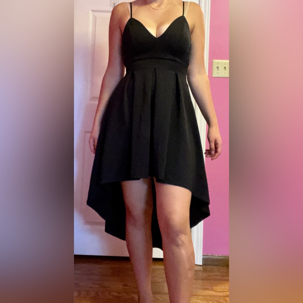 Black cocktail dress, only worn once. Brand: ReVamped. Size small.